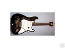 World Record Fender Squier Strat signed by The Darkness