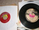box of old 45 records; rocknroll, rockabilly Sun labels
