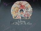 Queen Autographed Signed Album with COA