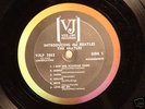 ORIGINAL INTRODUCING THE BEATLES VERS. 1 BRACKET LABEL