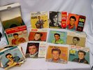 a 37 Vintage Elvis Presley 45 rpm Records & carry case 