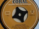 The Johnny Burnette Trio: Lonesome Train/The Train kept