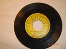 Original Elvis Sun 45 record. Baby let's play house