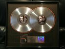 U2 RIAA RATTLE AND HUM. AWARD PRESENTED TO ARNIE ACOSTA