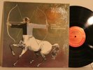 Sagittarius-Present Tense US psych lp in shrink