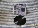 IRON MAIDEN FIRST LP WITH NEVER SEEN STRANGE COVER