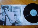TOM WAITS  BOUNCED CHECKS WITH RARE  BONUS TRACKS LP 