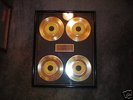 Very rare collectable elvis gold records in glass frame