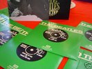 RARE VINTAGE BEATLES BOX SET OF 25 VINYL SINGLES