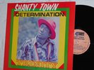 TRINITY/SHANTY TOWN DETERMINATION/