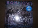 BON JOVI SIGNED SLIPPERY WHEN WET VINYL COA
