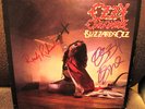 BILZZARD OF OZZ - SIGNED / AUTO OZZY AND RANDY RHOADS