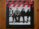 U2 - HOW TO DISMANTLE AN ATOMIC BOMB - SEALED LP w/book