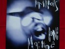 Tom Waits - Bone Machine.  Island LP with lyric inner