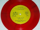 JULIO IGLESIAS A FLOR DE PÌEL BOLIVIA 7' RED VINYL