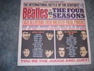 The Beatles vs. the four Seasons repro.