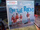 SURFERS On the Rocks  DON'T LOOK AT THIS AD IF YOU LIKE SURF MUSIC
