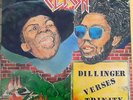 CLASH-DILLINGER VERSES TRINITY-BURNING ROCKERS-1977
