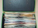 Over 40 Oldie 45s with green platter pak carry case