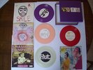 Siamese singles smashing pumpkins with coloured vinyl peach rocket. complete box