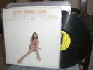 Bang Bang Lulu in New York with Sparrow's Troubadours LP Barbados sexy cover