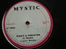 WHAT A DISASTER - JUNIOR BROWN - ROOTS REGGAE - ??