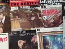 The Beatles E.P. Collection 45s in perfect condition,box a little worn from age