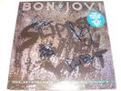 BON JOVI- SLIPPERY WHEN WET (LP SLEEVE SIGNED)