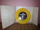 NIRVANA MELVINS SPLIT 7'' HERE SHE COMES CUSTARD YELLOW EFFECT VINYL