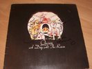 QUEEN - A DAY AT THE RACES - LP SLEEVE (SIGNED)