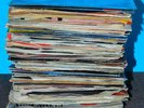 Pile of 93 - 45 rpm Vinyl Records.