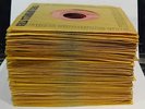 Stack of 59 Elvis Presley 45 rpm records