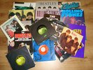 COLLECTION OF THE BEATLES & THE ROLLING STONES-28 RECORDS AND 13 BOOK