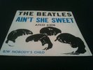 BEATLES  N MINT AIN'T SHE SWEET SLEEVE AND PROMO 45 WHITE LABEL VINYL