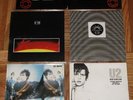 U2 Pac II,4x45 Ireland import plastic sleeve New Year's Day/Fire/Celebration/Glo