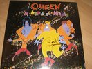 VINYL LP RECORD SLEEVE SIGNED BY QUEEN