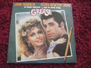 The Grease soundtrack LP sleeve signed By Travolta & Newton John