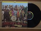 9 BEATLES LPS = SGT PEPPER + 8 FREE BONUS LPS
