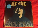 AC/DC-A GIANT DOSE OF ROCK N' ROLL-VINYL STILL SEALD-MINT