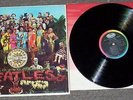 Sgt. Pepper The Beatles Near Mint 33 RPM Record Capitol MAS-2653 John Lennon