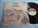 CARAVAN IN THE LAND OF GREY AND PINK UK PRESS IN MINT-