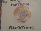 NOTHING BUT A HEATACHE THE FLIRTATIONS.