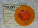 U2 Another Day orange vinyl 7 inch from Ireland CBS 8306