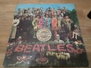 The Beatles LP Sgt Peppers UK Parlophone mono 1st press fools insert & swirl inn