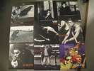 9 U2 45's w/Picture Sleeves, 4 from The Joshua Tree, 4 from Rattle & Hum - NM NR
