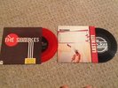 2 x The Strokes 7 inch singles. 12.51 on red vinyl and Last Nite rare limited ed