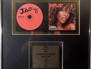 Kelis Tasty UK Gold Music Award to Kelis  BPI Schallplatte goldene record