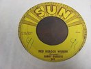 SONNY BURGESS - RED HEADED WOMAN B/W WE WANNA BOOGIE 45 ON SUN 247  ROCKABILLY