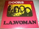 SEALED DOORS REISSUE LP...TITLED L.A. WOMAN...PURCHASED IN 1977