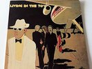 SKYHOOKS LIVING IN THE 70'S, SIGNED SHIRLEY STRACHAN AND BOB 'BONGO' STARKIE